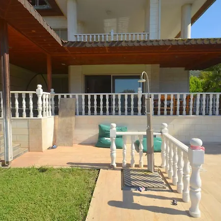 Bodrum 3 Bedroom Holiday Homes Сasa de vacaciones Gulluk